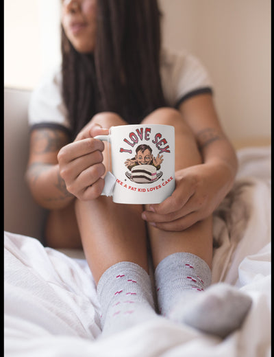 Tall glossy ceramic mug If you like Sex and coffee this Mug is for you